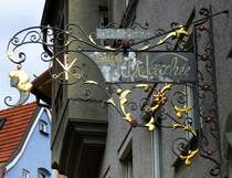 Fssen, Schild an einem Friseursalon, April 2014