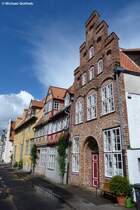 Nach dem Regen folgt Sonnenschein - Huserzeile im Stadtzentrum von Lbeck (Mai 2011)