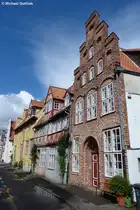 Nach dem Regen folgt Sonnenschein - H�userzeile im Stadtzentrum von L�beck (Mai 2011)