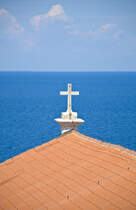 Kreuz auf der Kathedrale St. Georg in Piran. Aufnahme: 26. Juli 2016.