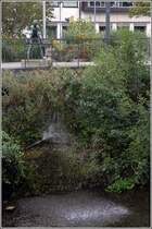 Osnabrck. Seit 1984 begutachtet  Der Spezialist  den Rohrbruch an der Wittekindstrae in Osnabrck. Er wurde vom Bildhauer Hans Gerd Ruwe (1926 - 1995) geschaffen. 02.09.2017