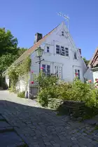 Ein Haus in �Gamle Stavanger� in der Stadtmitte, hinter dem Hafen (V�gen). In dem Stadtteil sind mehrere Galerien und Kunsthandwerker zuhause.
Aufnahm: 2. Juli 2018.