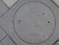 Auch in China verziert man Gullydeckel. 09/2007