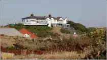 Langeoog. Blick durch die D�nen zur Strandhalle. 18.09.2018