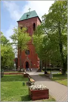 Kamien Pomorski (Cammin). Hinter den B�umen ist der Turm der Kathedrale St. Johannes zu sehen, auch Dom zu Camminn genannt. Cammin war von 1140 bis 1810 Bischofssitz. 10.05.2019