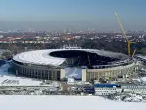 Umbau des Berliner Olympiastadion, 2000 bis 2004. Sechs Monate vor der geplanten Er�ffnung des umgebauten  Stadions im Jahre 2004. Manchmal klappen Bauarbeiten auch in Berlin... Foto: 24.01.2004