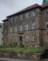 Das H�nfelder Amtsgericht im Juli 2021.
Erbaut wurde das Amtsgeb�ude 1850 aus dem Abbruchmaterial der alten H�nfelder Stiftskirche.