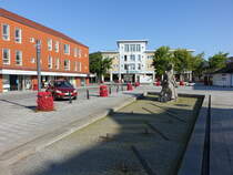 Faxe, Brunnen und Huser am Kirketorvet (19.07.2021)